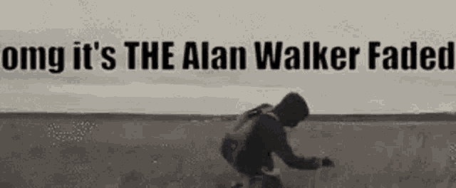 a black and white photo of a man riding a bike in a field .