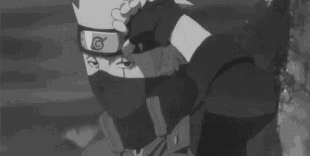 a black and white photo of a person wearing a mask and a headband .