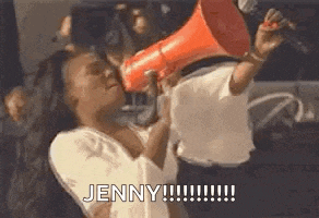 a woman is holding a megaphone in her mouth and screaming jenny .