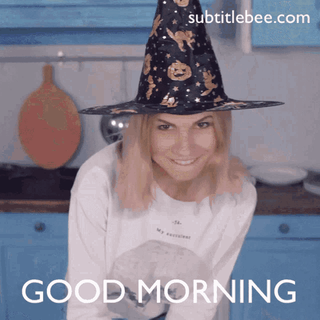 a woman wearing a witch hat says good morning on the bottom