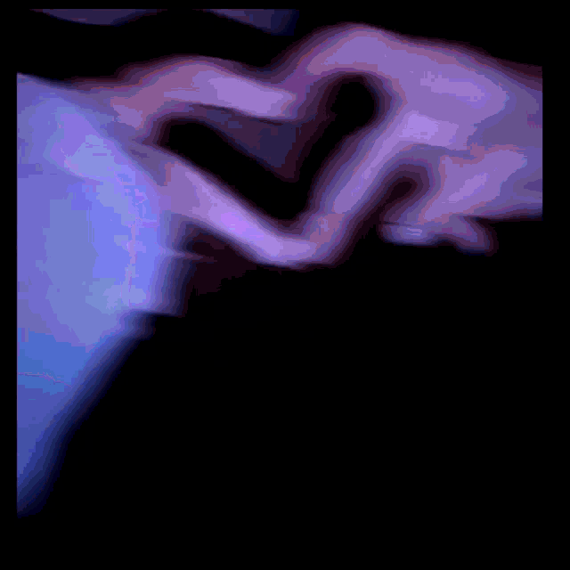 a close up of a purple and blue background with a black frame