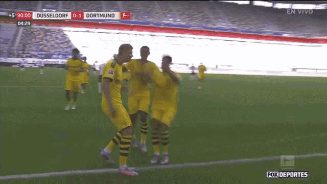 a soccer game between dusseldorf and dortmund is being broadcast on fox deportes