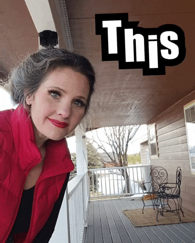 a woman in a red vest stands on a porch with the words this above her
