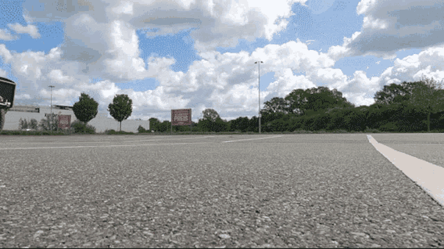 an empty parking lot with a red sign that says focus