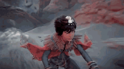a cartoon character is standing in the desert with a red cape .