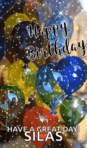 a bunch of balloons with the words `` happy birthday `` written on them .
