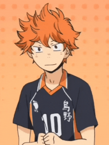 a boy with orange hair is wearing a number 10 jersey