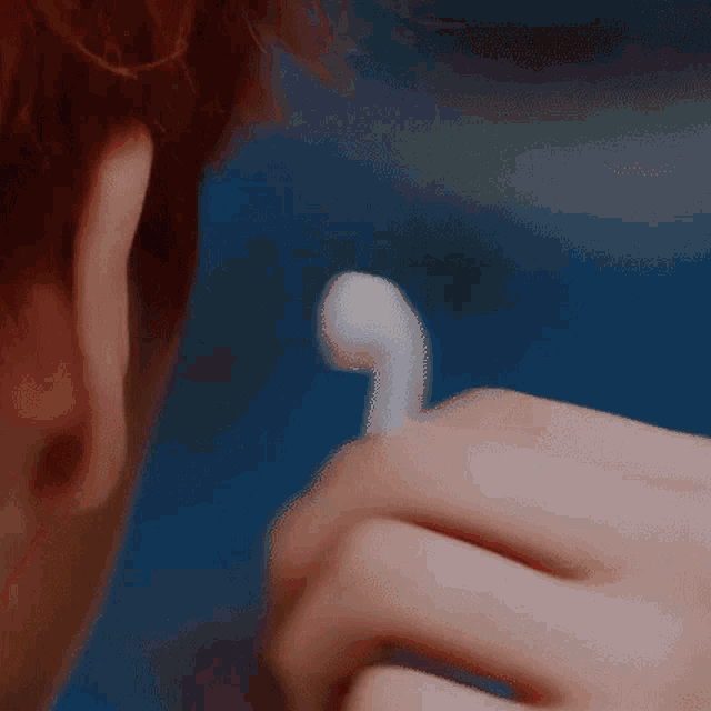a close up of a person 's face with their mouth wide open