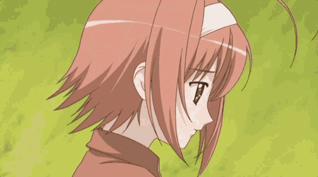 a girl with red hair and a white headband