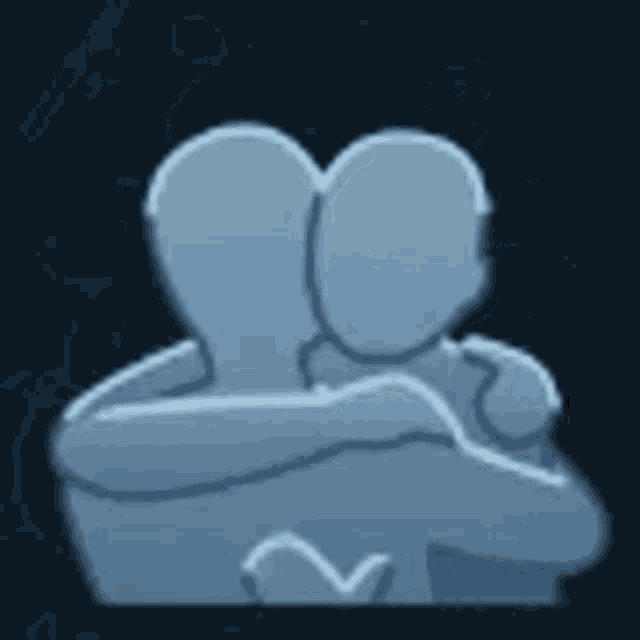 a couple of people hugging each other with a heart in the middle of their arms .