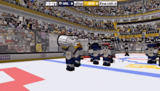 a hockey game is being played in a stadium with espn in the upper left corner
