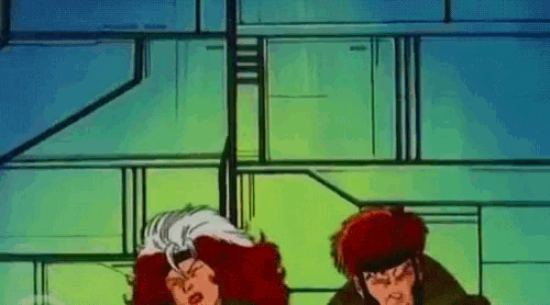 two cartoon characters are standing next to each other in front of a green wall .