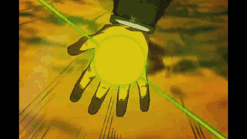 a person 's hand is holding a yellow object in their hand