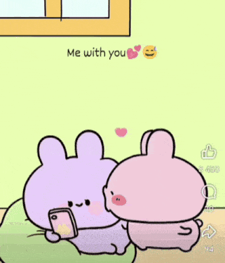 two cartoon rabbits are sitting next to each other and one is holding a cell phone