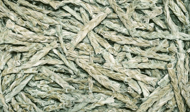 a close up of a pile of straw that looks like a carpet