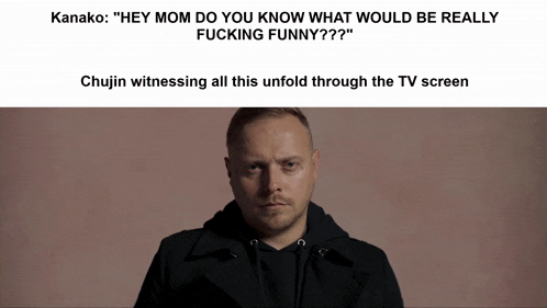 a man with a tattoo on his forehead looks at the camera