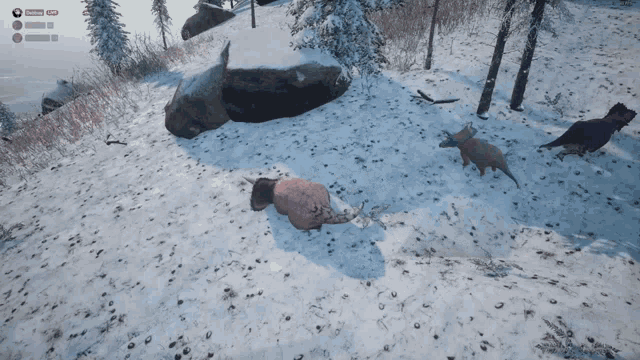 a screenshot of a video game shows a rhino and two dinosaurs in the snow