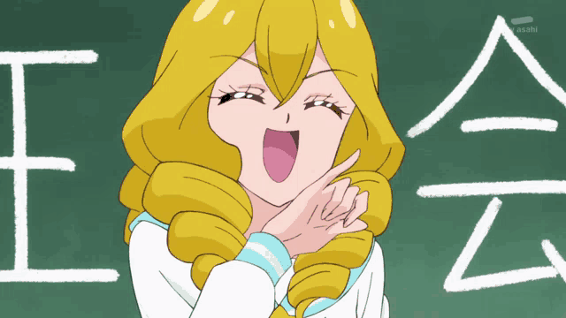 a girl with blonde hair is laughing in front of a blackboard that says asahi on it