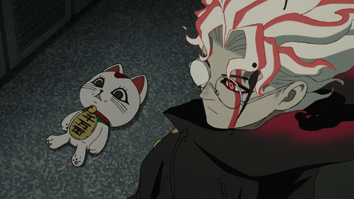 a man with blood on his face is standing next to a cat with chinese writing on its neck