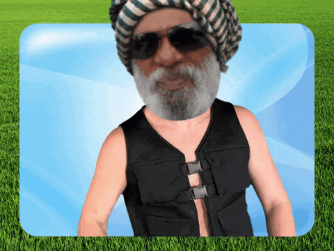 a man with a beard is wearing sunglasses and a black vest