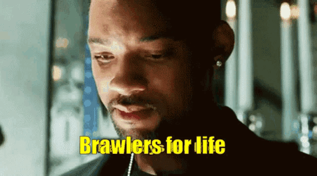 a man with the words brawlers for life above his head