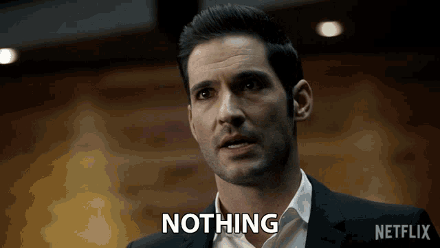 a man in a suit is saying nothing in front of a netflix logo