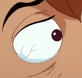 a close up of a cartoon character 's eye with a tear running down it
