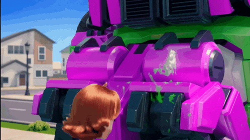 a girl standing next to a purple robot with green paint on it