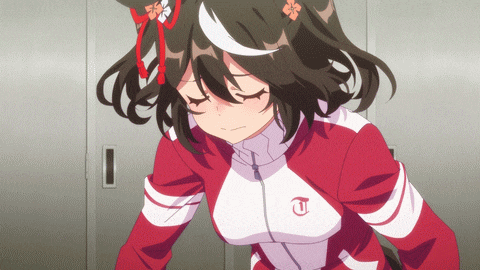 a girl in a red and white jacket with a letter t on it