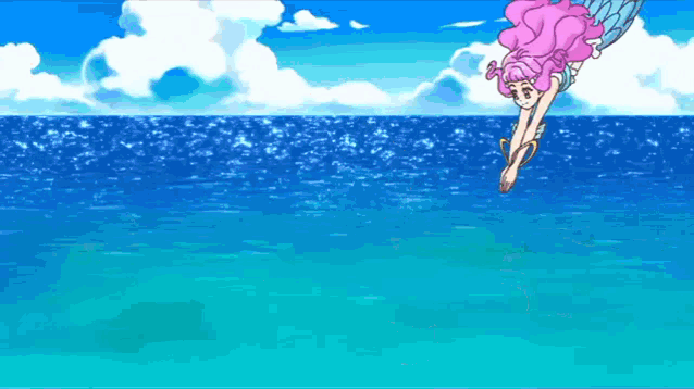 a mermaid with pink hair is diving into the ocean