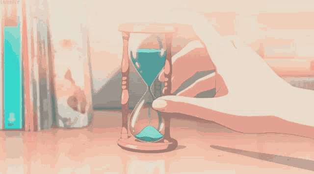 a person is holding a hourglass with the word butterfly on the bottom
