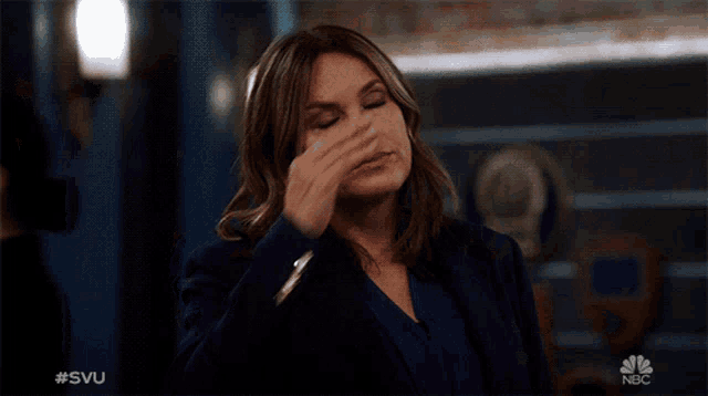 a woman 's face is shown in a nbc ad