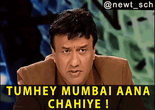 a man in a suit says tumhey mumbai aana chahiye !