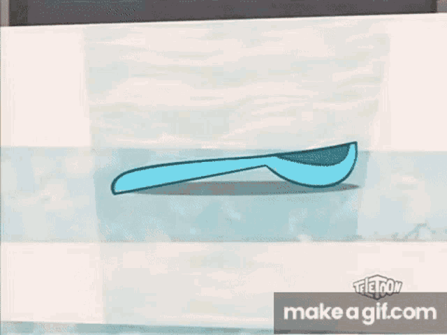 a cartoon character is sitting at a table with a spoon in its mouth .