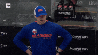 a man in a blue shirt that says islanders on it