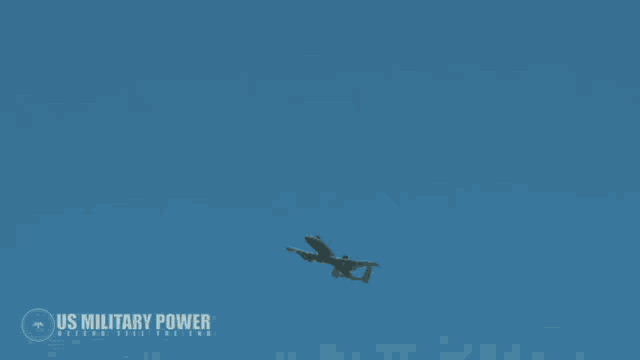 a us military power logo is displayed on a desert scene