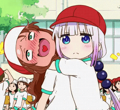 a girl with blue eyes is hugging another girl with brown hair