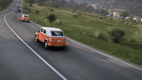 a car with a license plate that says ' nc ' on it is driving down the road
