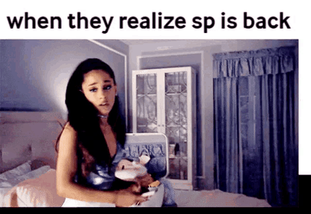 a woman in a bedroom with the words when they realize sp is back on the bottom