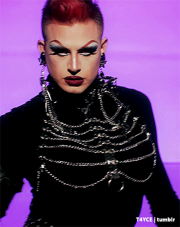a close up of a drag queen 's face with t4yce tumblr in the bottom right corner