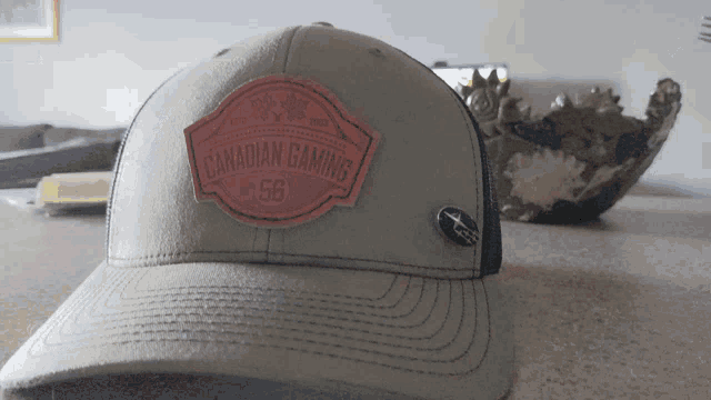 a baseball cap that says canadian gaming 58 on it