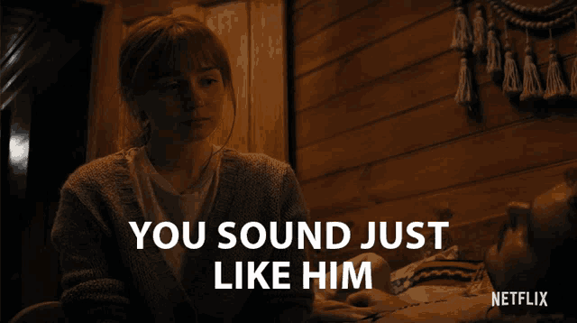 a netflix ad shows a woman sitting next to a man laying on a bed