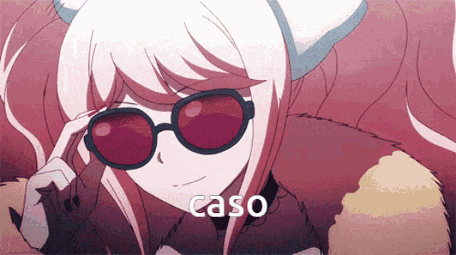 a picture of a girl wearing sunglasses and the word caso