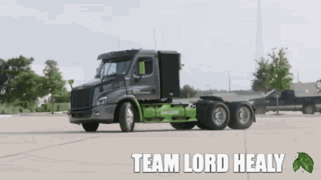 a semi truck with the words team lord healy on the bottom