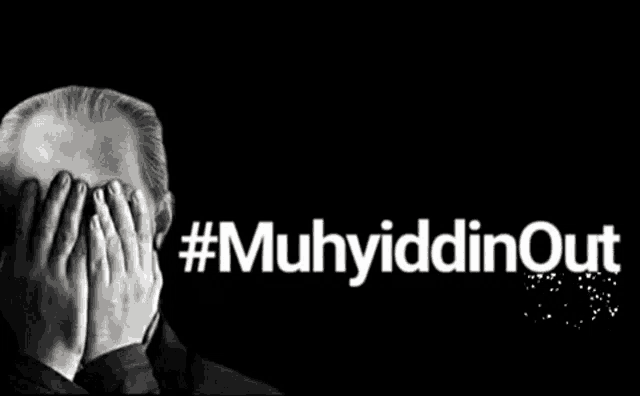 a black and white photo of a man covering his face with his hands and the words #muhyidinout below him