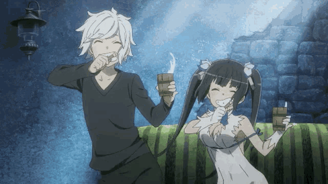 a boy and a girl are drinking from wooden cups