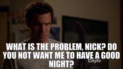 a man stands in front of a wall with the words " what is the problem nick do you not want me to have a good night "
