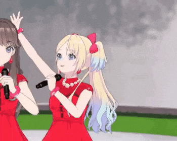 two anime girls in red dresses singing into microphones on stage