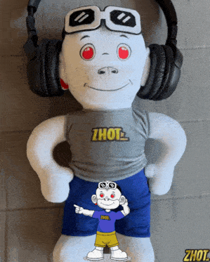 a stuffed monkey wearing headphones and a shirt that says ' zhot ' on it