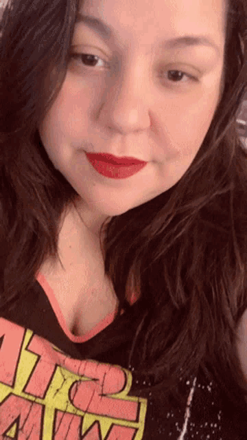 a woman wearing a shirt that says star wars